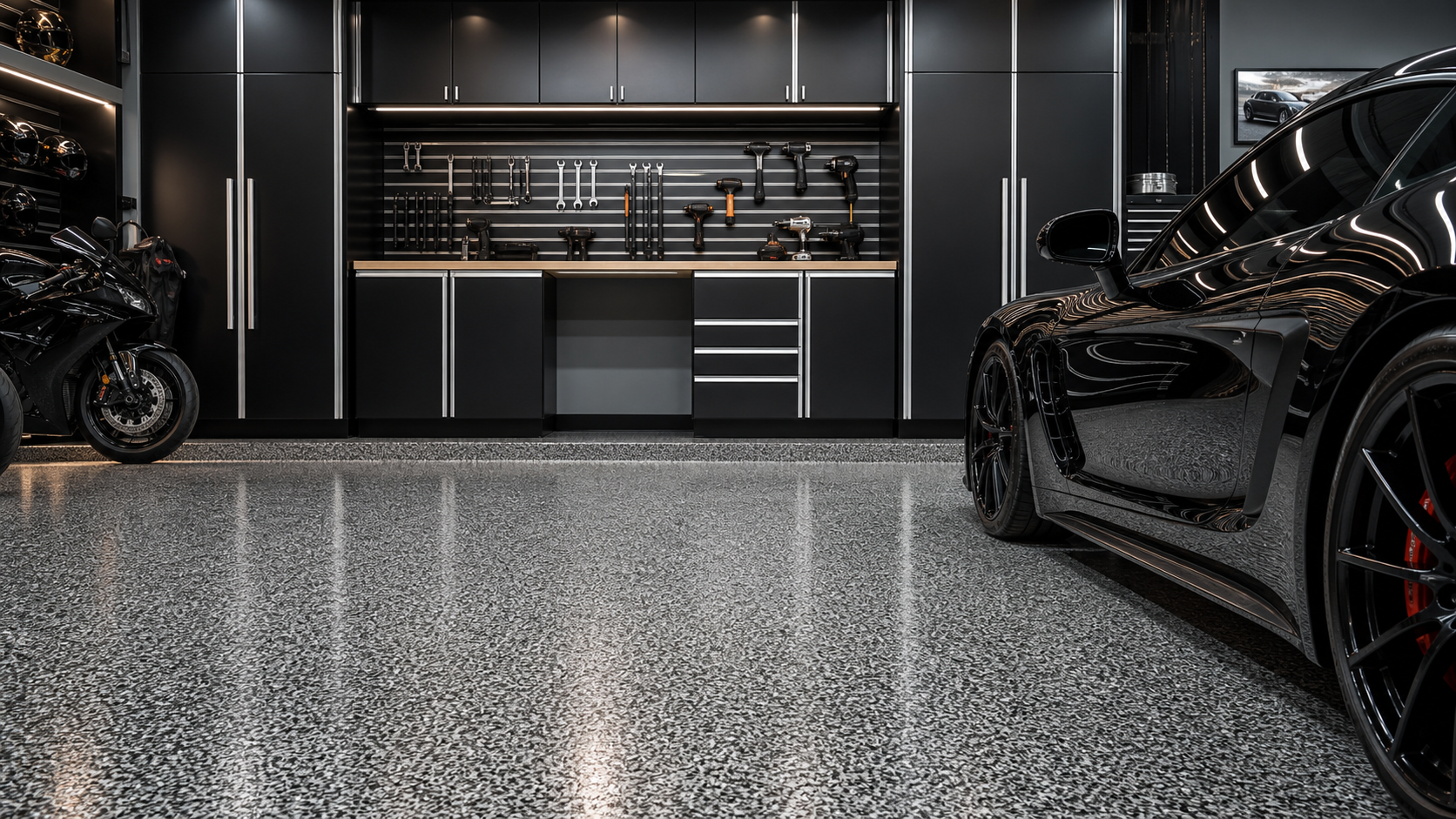 Custom garage floor installation with black car